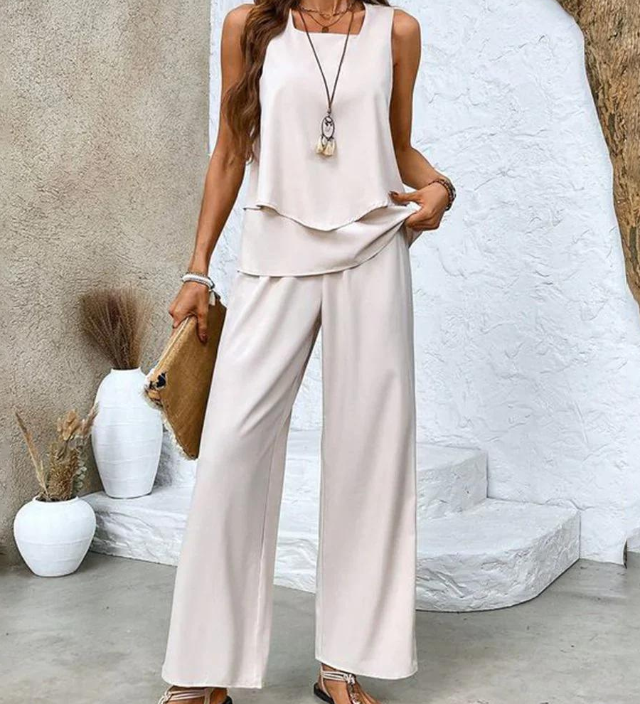 Alba | Conjunto de blusa e calça com estampa floral estilosa