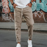 Calças de homem em ganga estilo jogger, algodão, corte loose fit