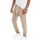 Calças de homem em ganga estilo jogger, algodão, corte loose fit